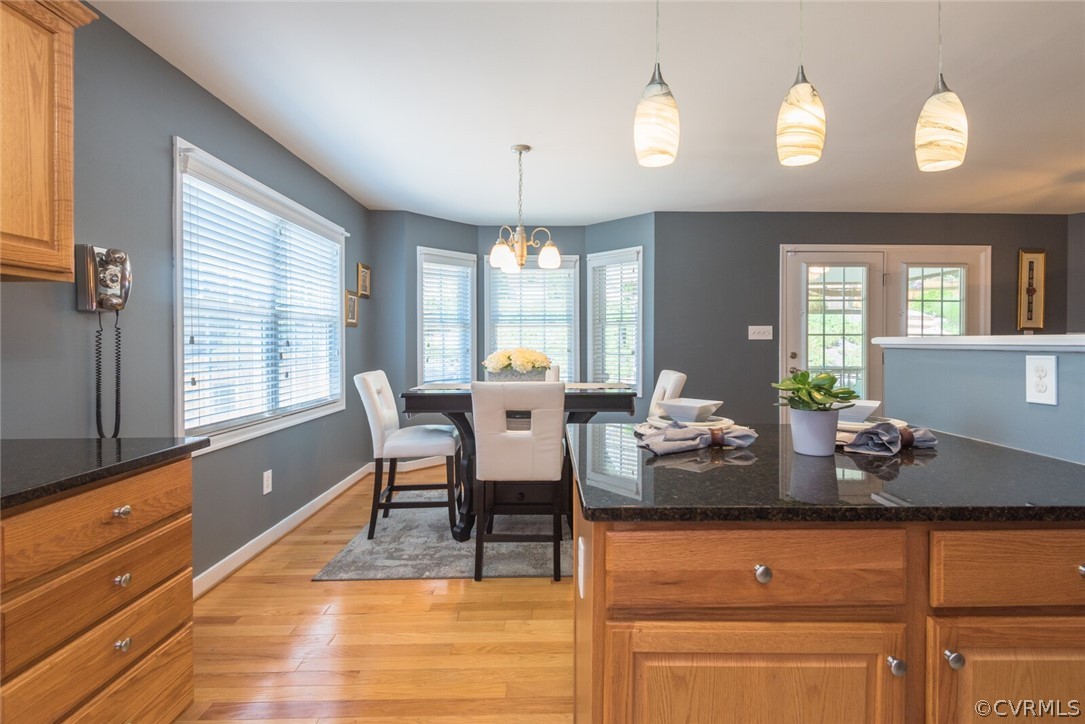 11616 Hillside Road Chester, VA 23831 - Photo 15 of 42 a view of a dining room with furniture and window