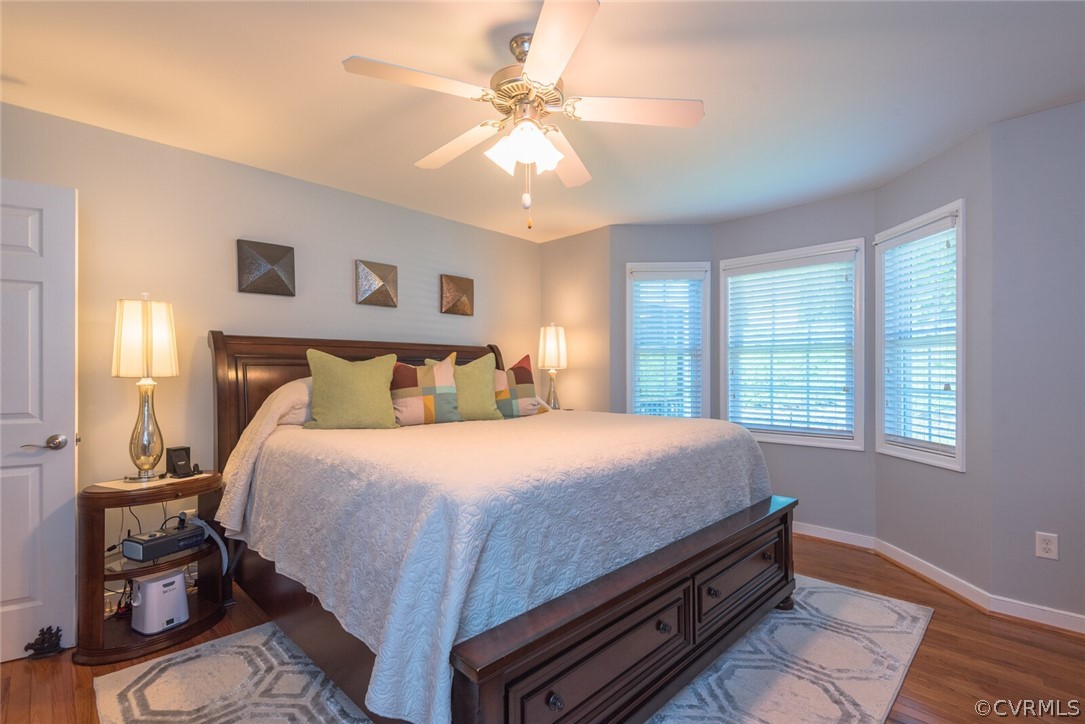 11616 Hillside Road Chester, VA 23831 - Photo 18 of 42 a bedroom with a bed and window