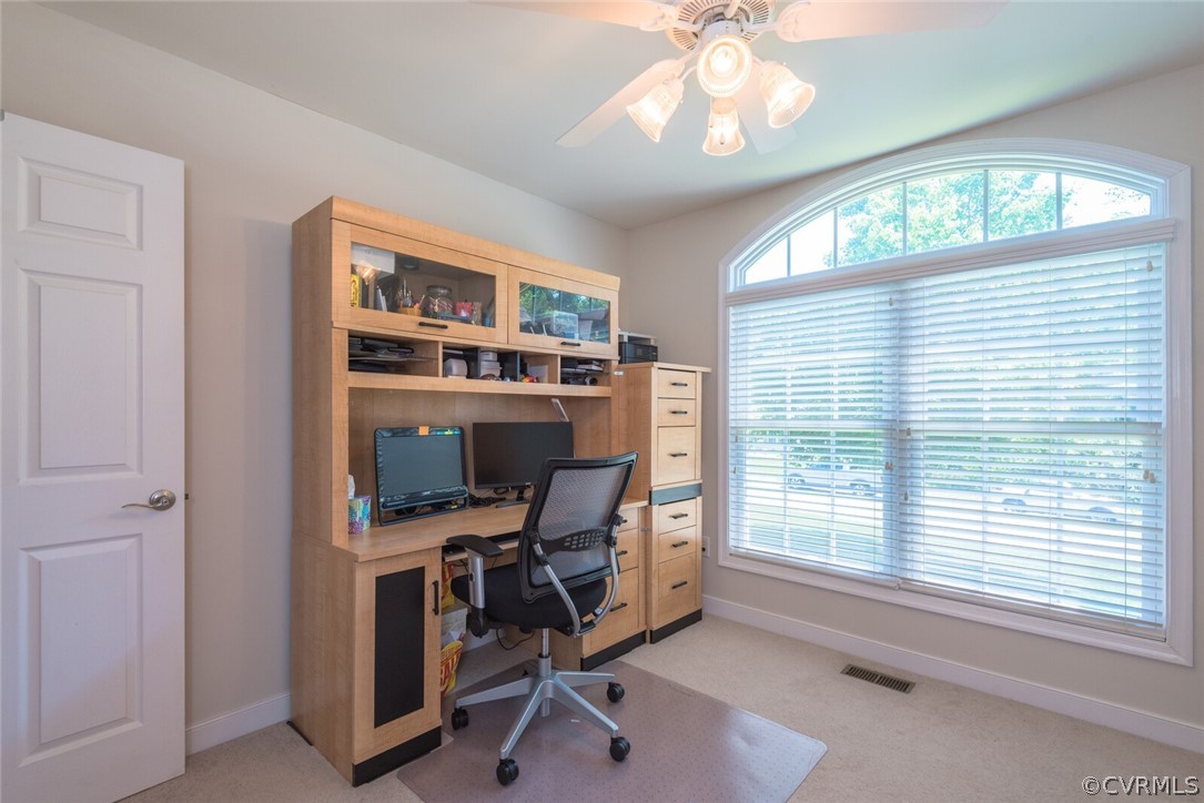 11616 Hillside Road Chester, VA 23831 - Photo 29 of 42 a view of a workspace with furniture and a window