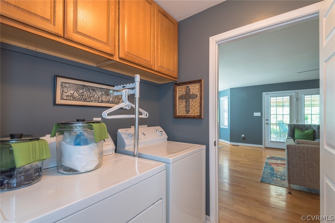 11616 Hillside Road Chester, VA 23831 - Photo 31 of 42 a view of a dining room with furniture and wooden floor