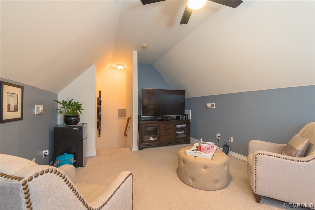 11616 Hillside Road Chester, VA 23831 - Photo 33 of 42 a living room with furniture and a flat screen tv
