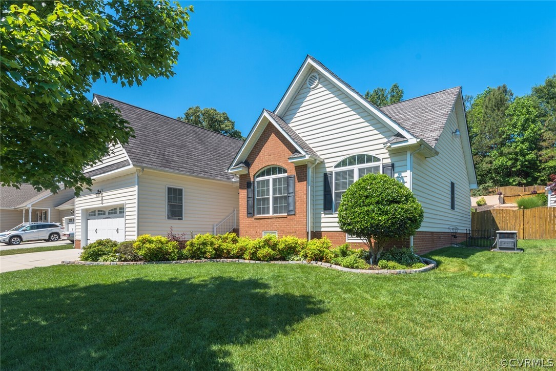 11616 Hillside Road Chester, VA 23831 - Photo 4 of 42 a front view of house with yard and green space