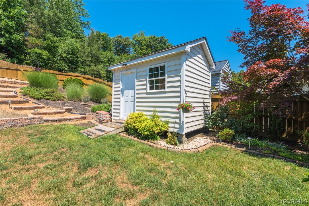 11616 Hillside Road Chester, VA 23831 - Photo 41 of 42 a front view of a house with garden