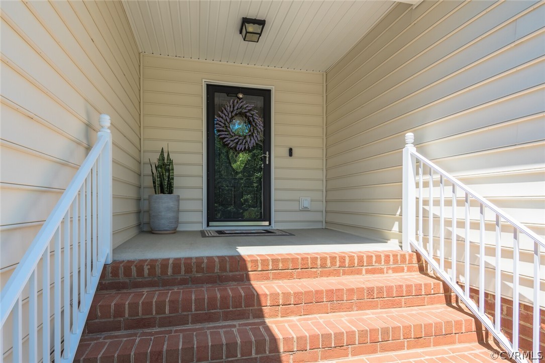 11616 Hillside Road Chester, VA 23831 - Photo 5 of 42 a view of a brick house with an outdoor space
