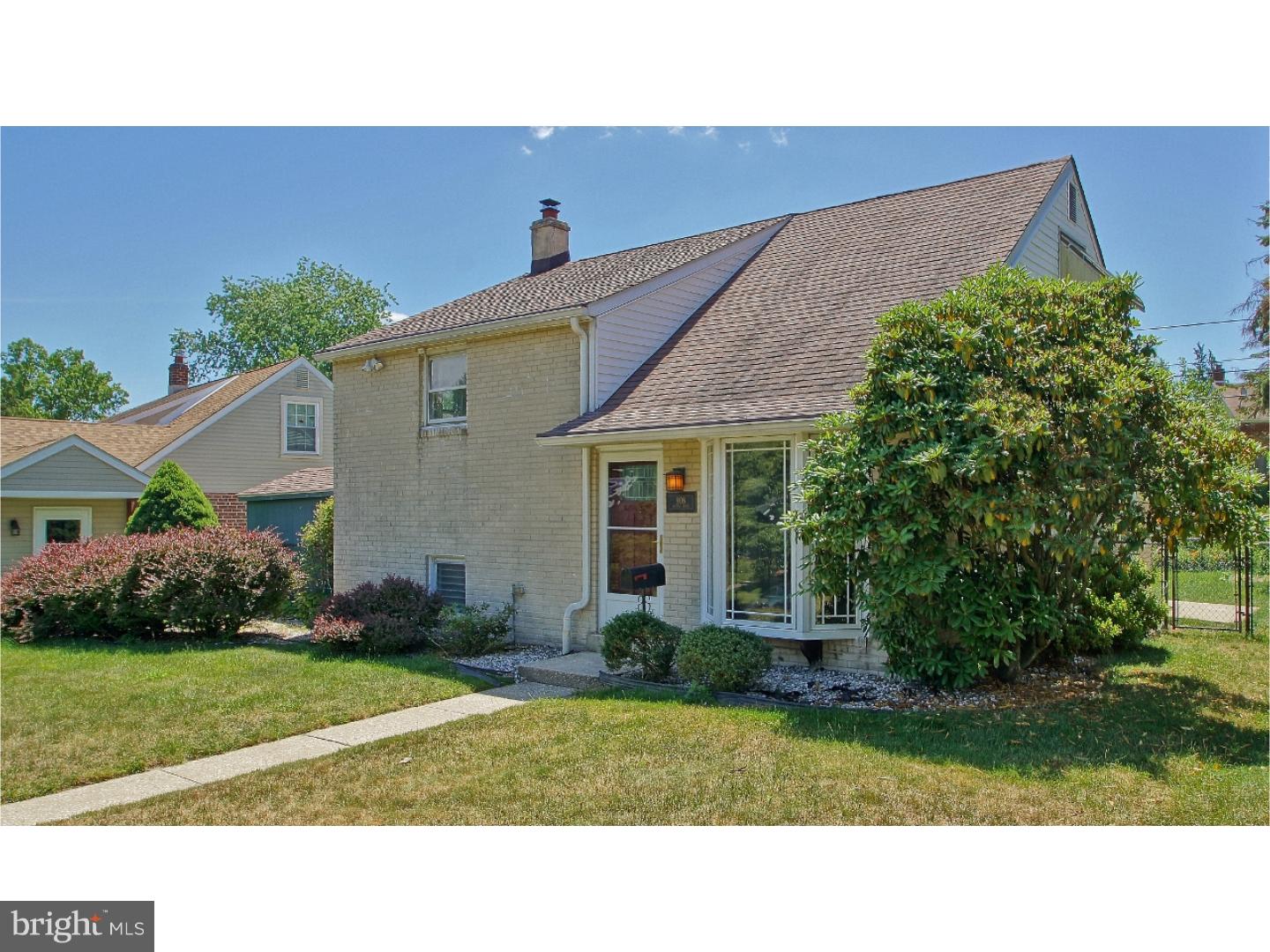 908 Scotia Road Philadelphia, PA 19128 - Photo 2 of 18 a black and white house with a yard