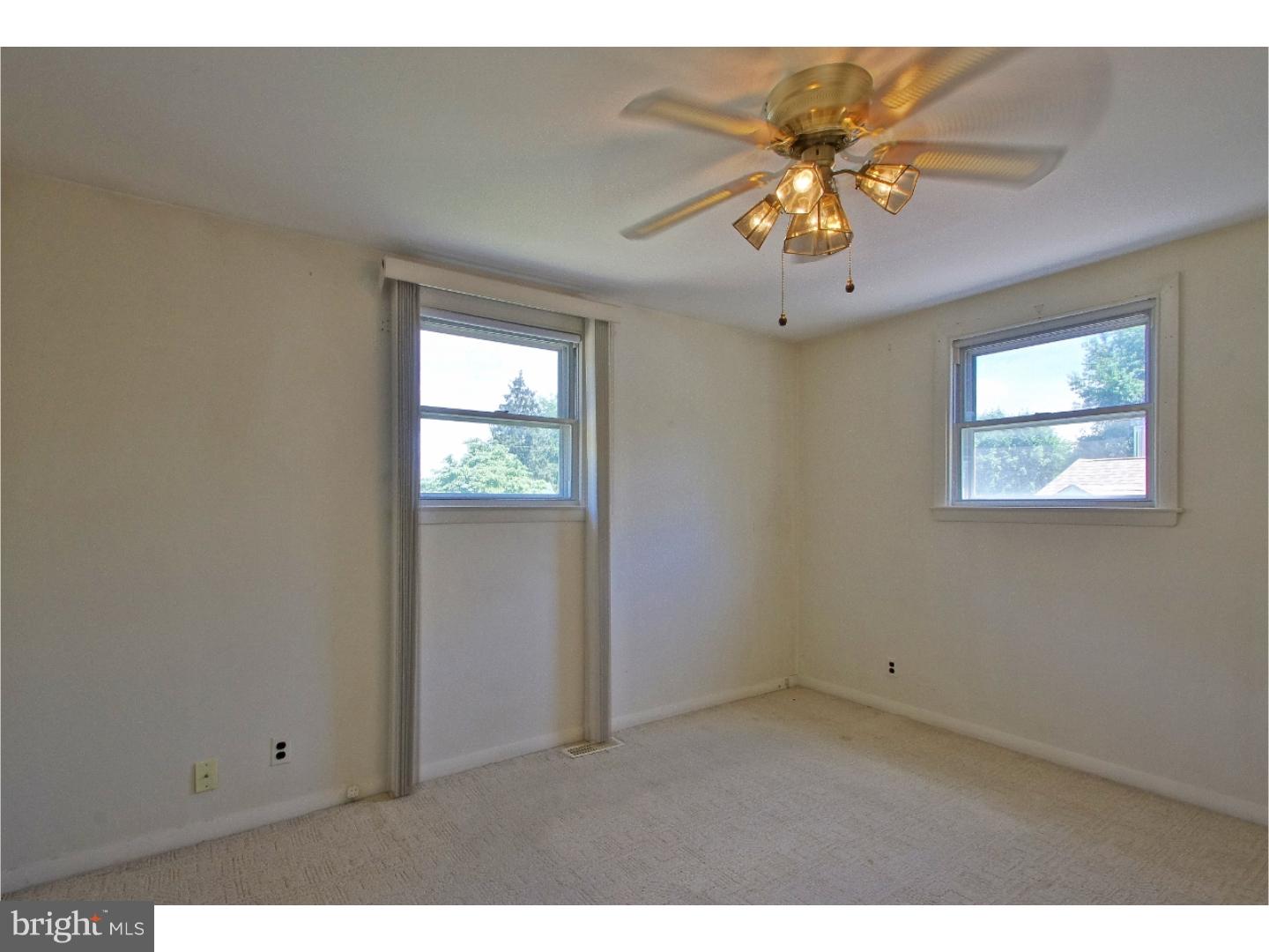 908 Scotia Road Philadelphia, PA 19128 - Photo 12 of 18 a view of an empty room with a window