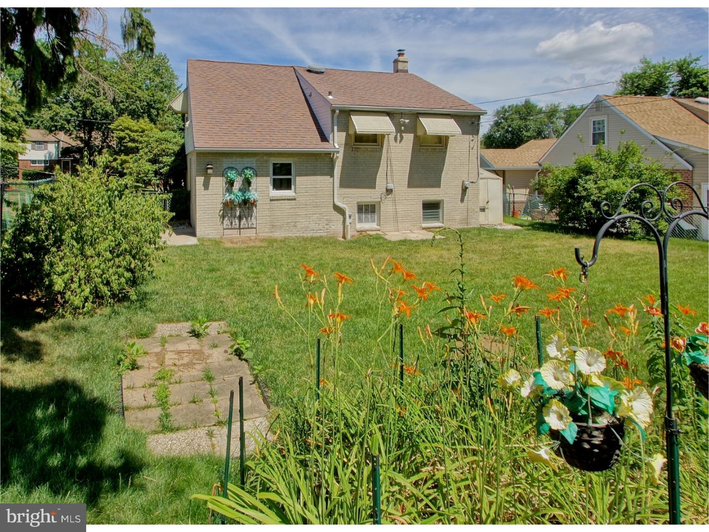 908 Scotia Road Philadelphia, PA 19128 - Photo 5 of 18 an aerial view of a house with garden