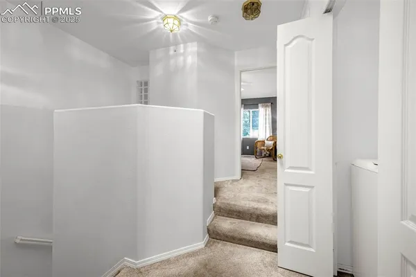 a view of a hallway view with living room