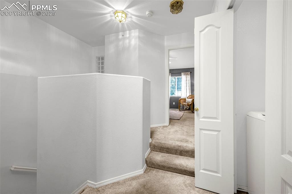 3254 Apogee View Colorado Springs, CO 80906 - Photo 19 of 28 a view of a hallway view with living room