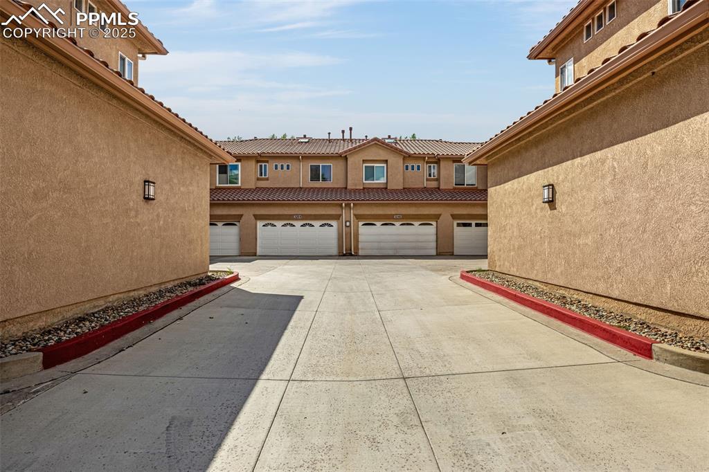 3254 Apogee View Colorado Springs, CO 80906 - Photo 25 of 28 a view of a building with a large space