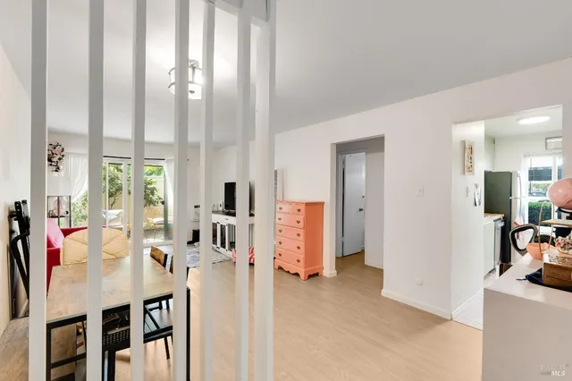 a view of a dining room with furniture window and outside view