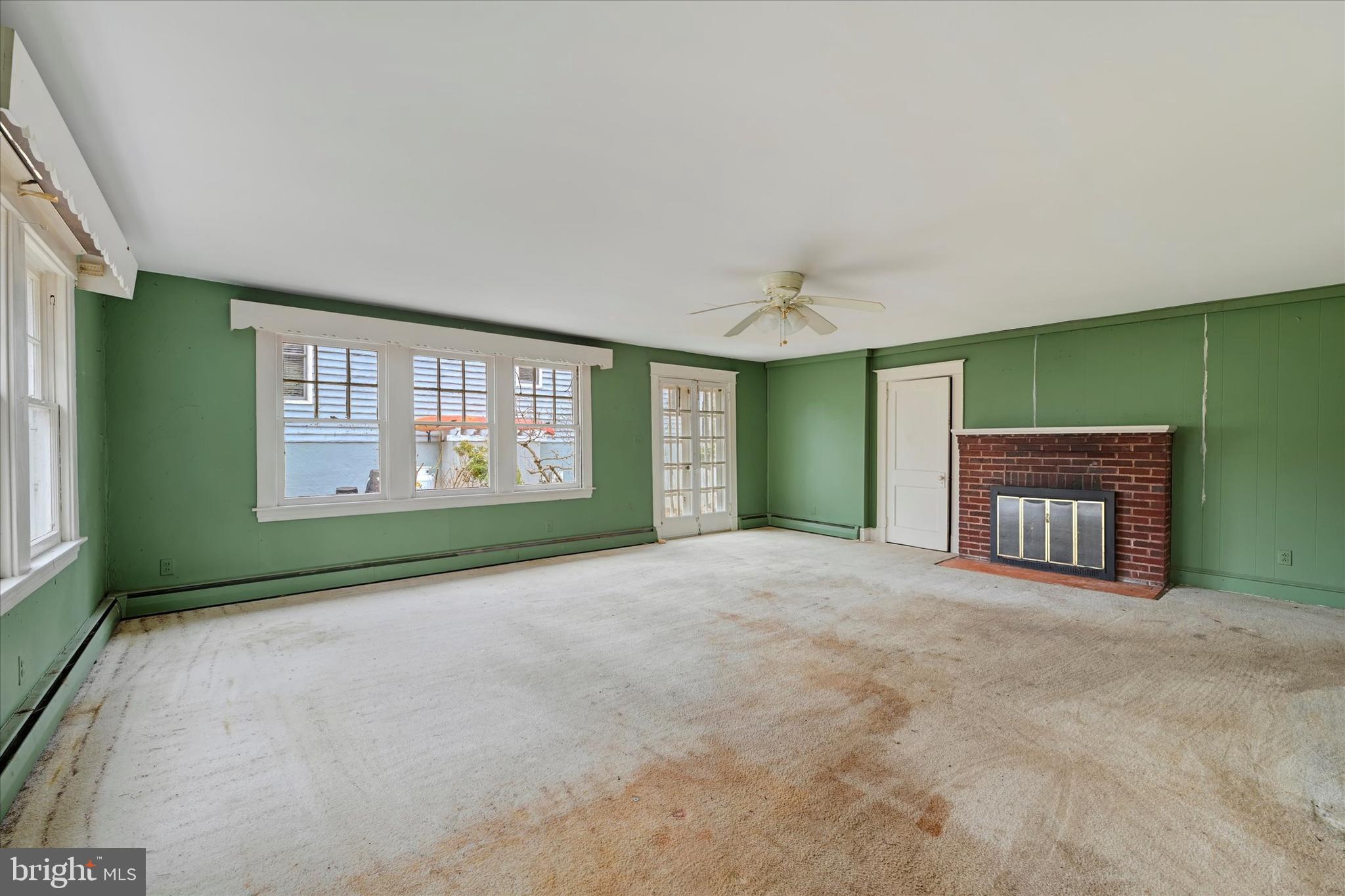 12 Decatur Avenue Annapolis, MD 21403 - Photo 3 of 21 a view of an empty room with window and fireplace