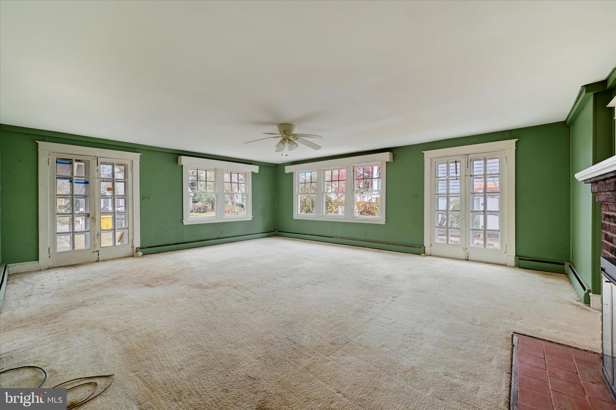 12 Decatur Avenue Annapolis, MD 21403 - Photo 5 of 21 a view of an empty room with a window and a kitchen
