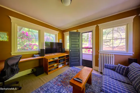 a bed room with a bed and a lamp