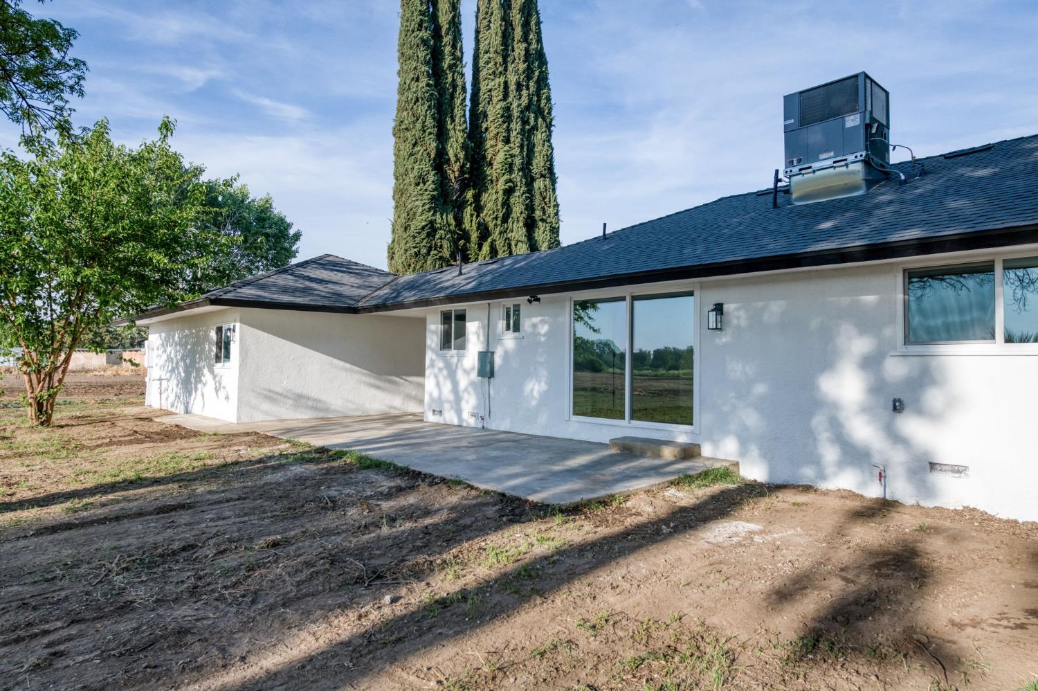 545 North Rio Vista Avenue Sanger, CA 93657 - Photo 35 of 46 a view of a house with a yard