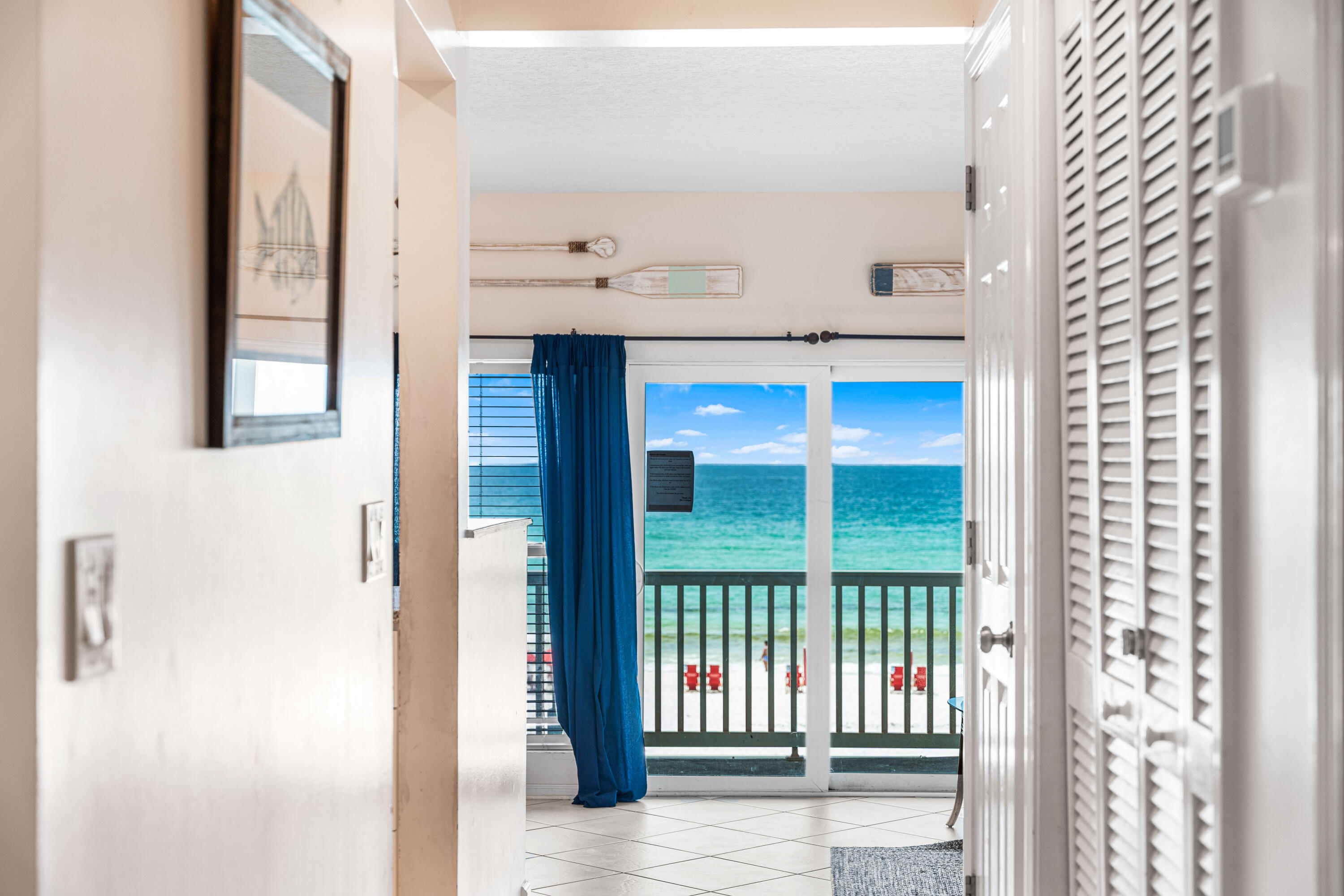 142 Beachside Drive, Unit 7 Santa Rosa Beach, FL 32459 - Photo 2 of 41 a view of an entryway with a kitchen