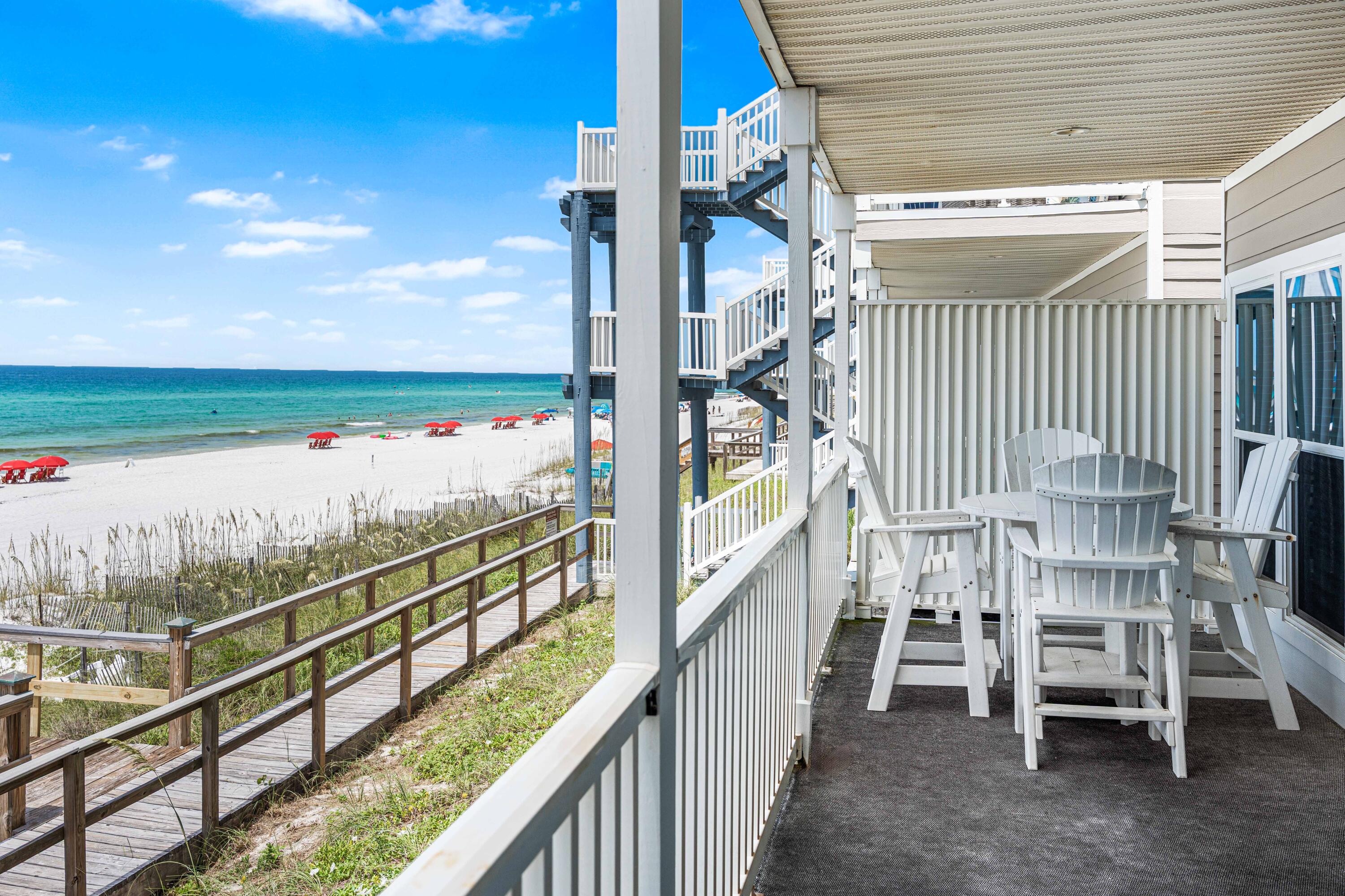 142 Beachside Drive, Unit 7 Santa Rosa Beach, FL 32459 - Photo 39 of 41 a view of a balcony with chairs