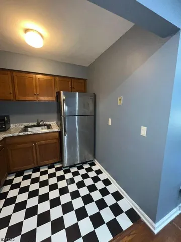 a black and white checkered floor with a black white checkered floor