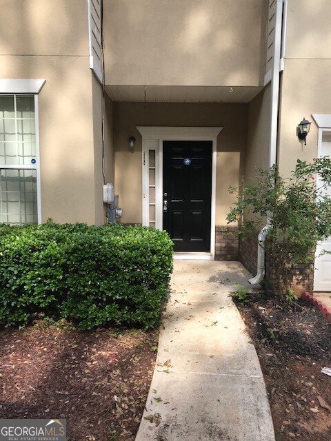 2320 Coach Way Jonesboro, GA 30236 - Photo 5 of 6 a view of a back yard of the house