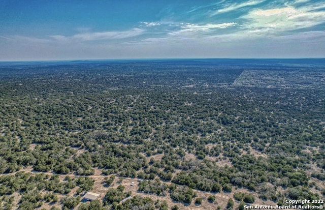 24 Leona Ranch Brackettville, TX 78832 - Photo 16 of 23 an aerial view of residential houses with outdoor space