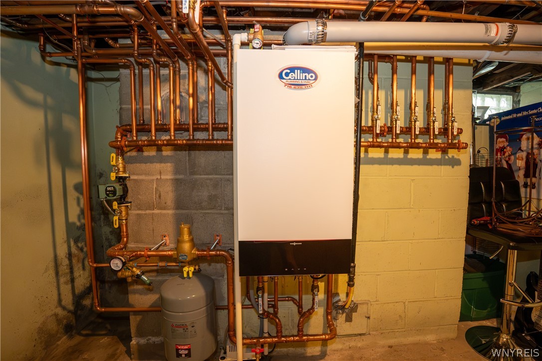 10775 Main Street Clarence, NY 14031 - Photo 49 of 50 Adjustable zone heater and on demand water tank 20