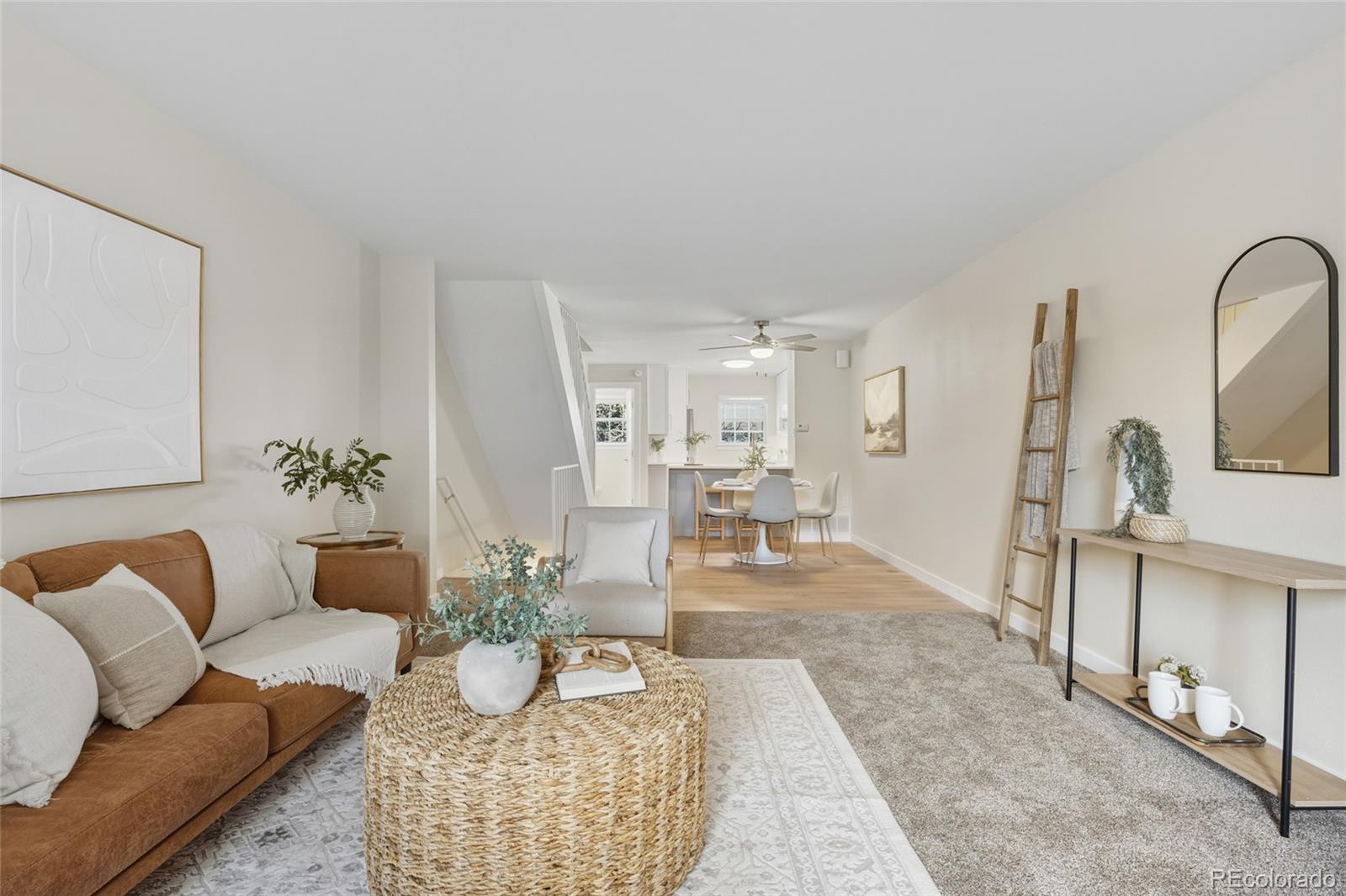 1811 South Quebec Way, Unit 82 Denver, CO 80231 - Photo 6 of 35 a living room with furniture