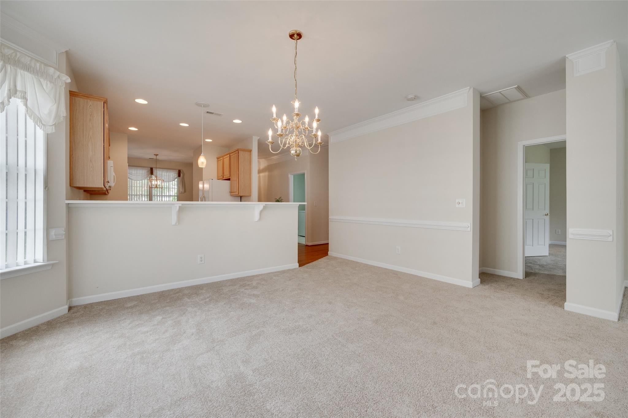 422 Garnet Court Fort Mill, SC 29708 - Photo 13 of 45 a view of a kitchen with a chandelier