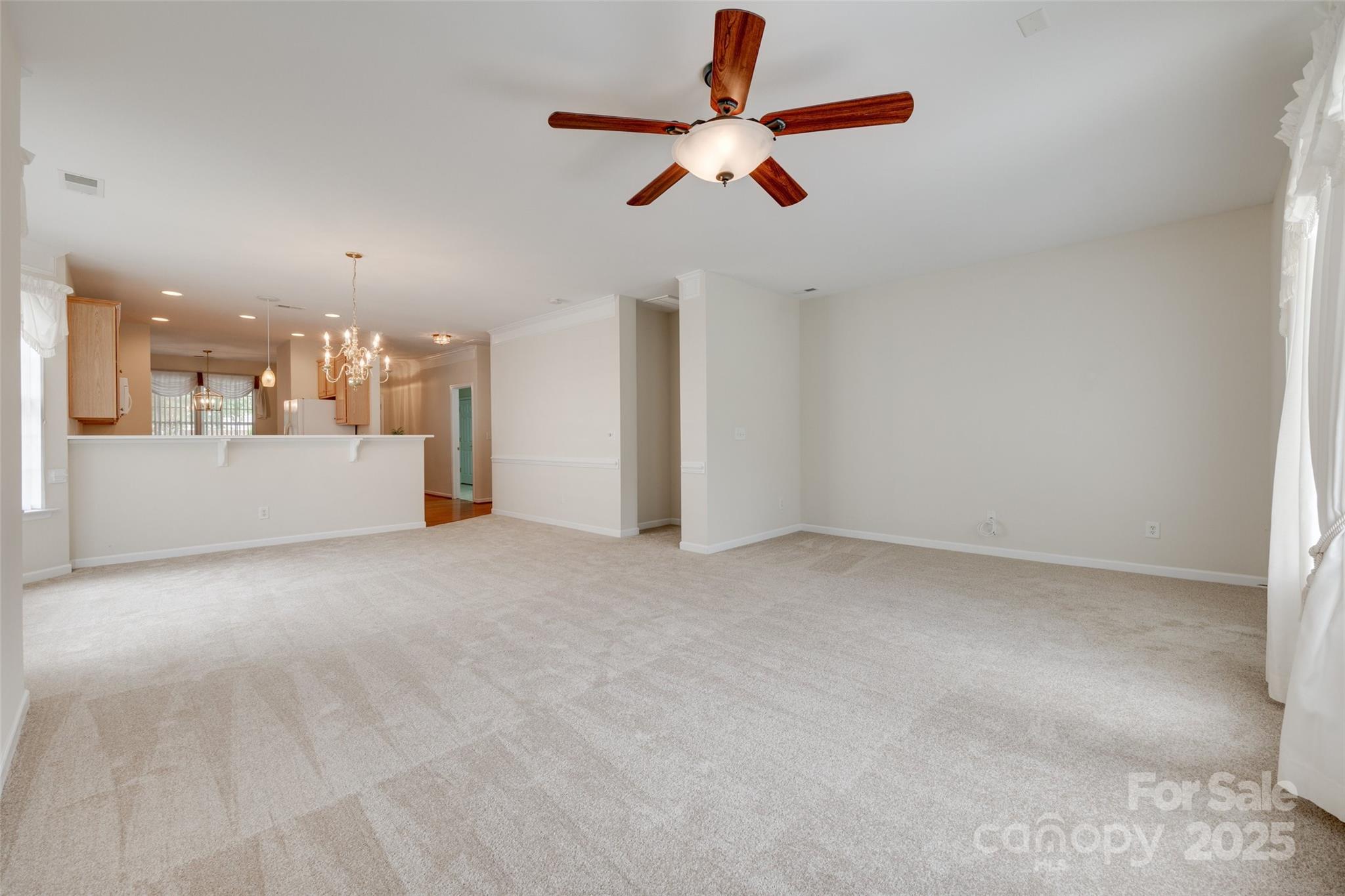 422 Garnet Court Fort Mill, SC 29708 - Photo 15 of 45 a view of a livingroom with a kitchen