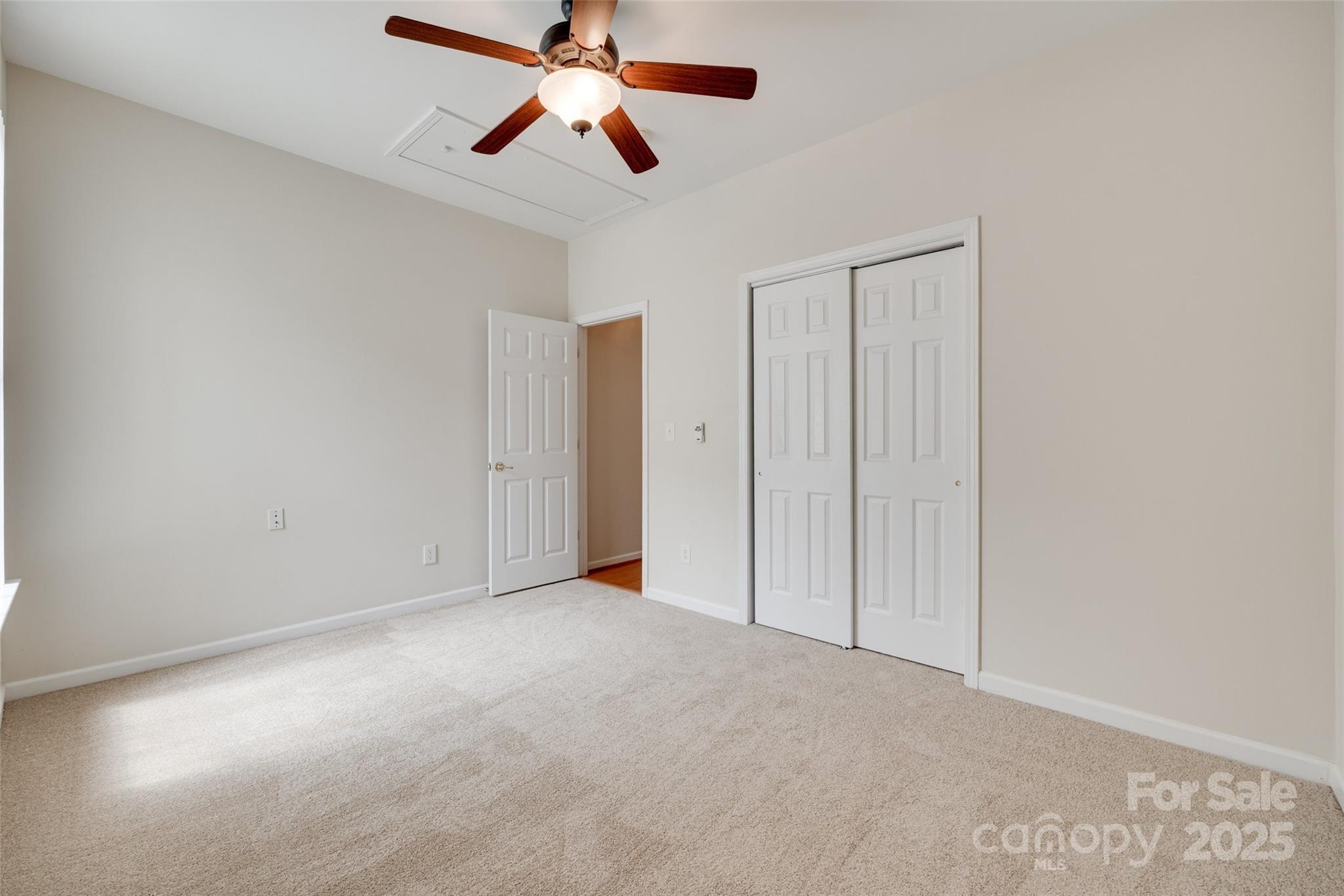 422 Garnet Court Fort Mill, SC 29708 - Photo 17 of 45 an empty room with chandelier fan