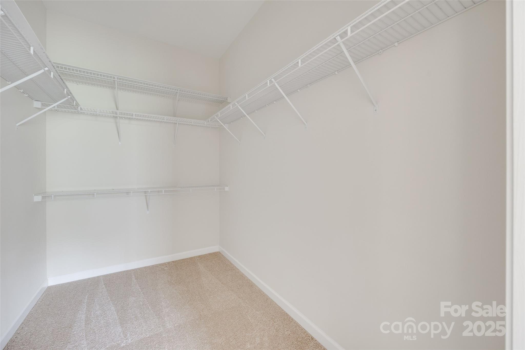 422 Garnet Court Fort Mill, SC 29708 - Photo 24 of 45 a view of a room with racks on the wall