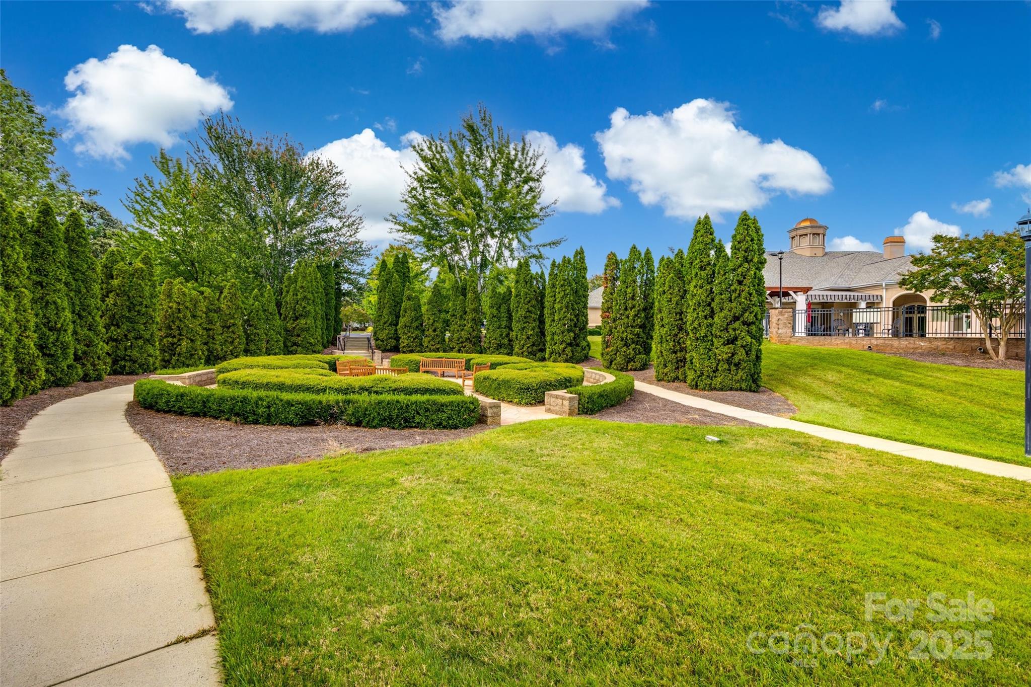 422 Garnet Court Fort Mill, SC 29708 - Photo 39 of 45 a view of a fountain in front of a house with a big yard