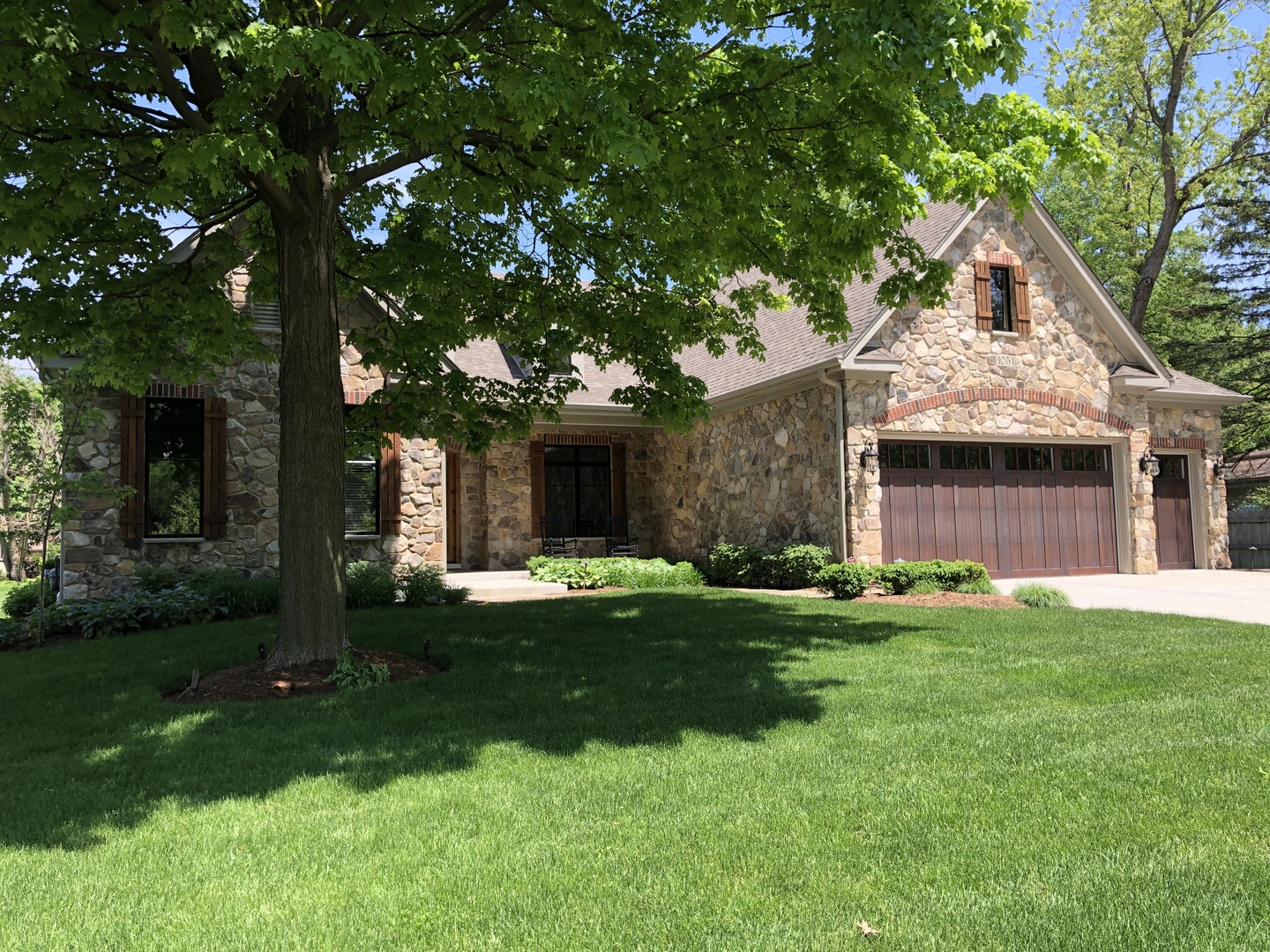 1051 Parkside Road Naperville, IL 60540 - Photo 2 of 52 front view of a house with a yard