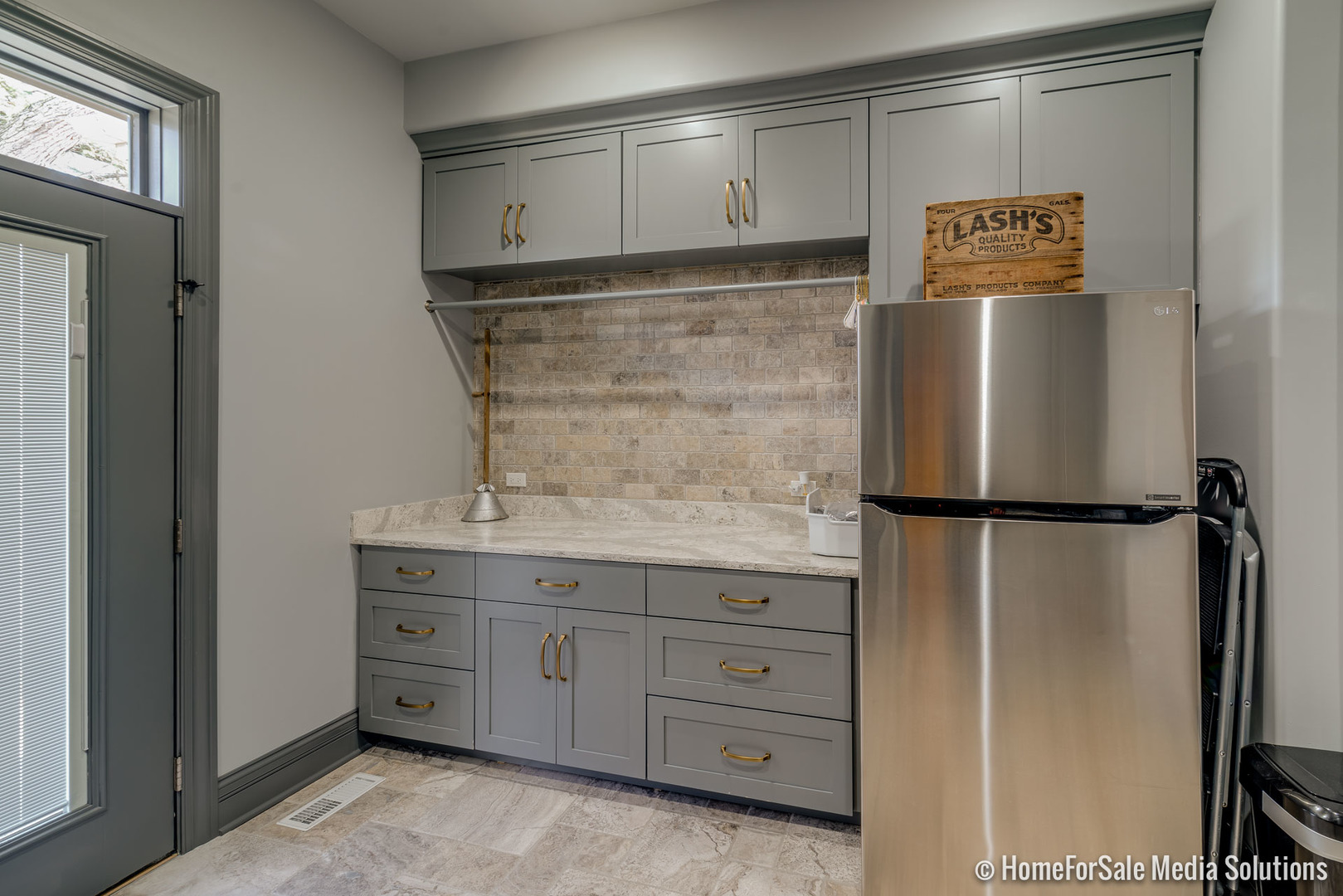 1051 Parkside Road Naperville, IL 60540 - Photo 13 of 52 a view of a kitchen with cabinets and a refrigerator