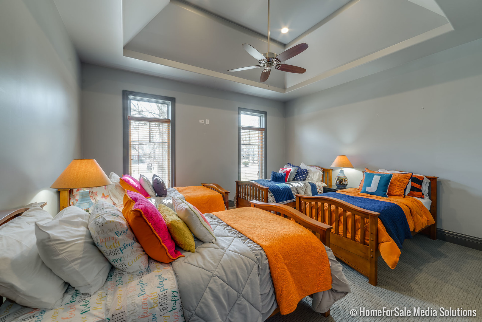 1051 Parkside Road Naperville, IL 60540 - Photo 16 of 52 a bedroom with two beds and a chandelier