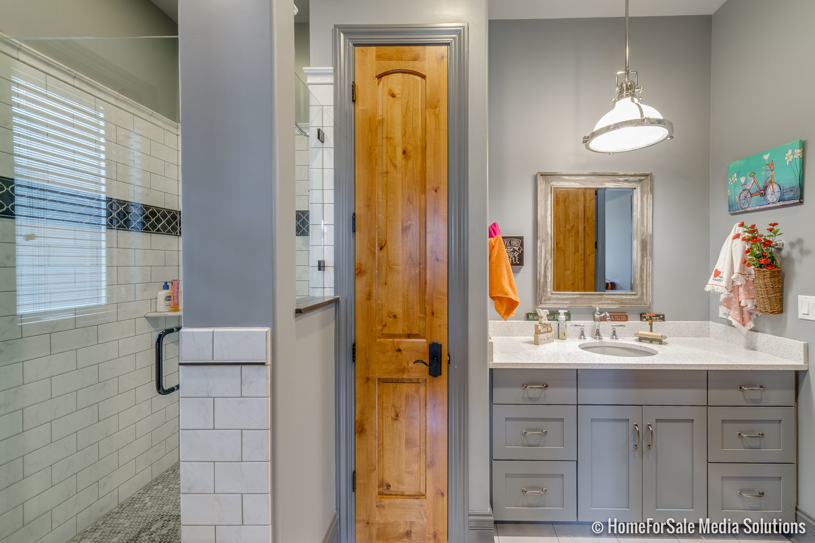 1051 Parkside Road Naperville, IL 60540 - Photo 20 of 52 a bathroom with a double vanity sink a mirror and a shower