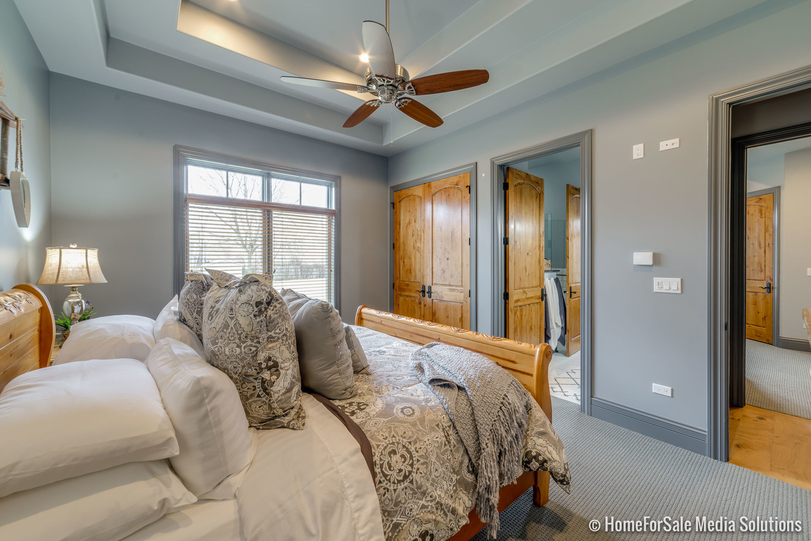 1051 Parkside Road Naperville, IL 60540 - Photo 22 of 52 a bedroom with a bed and a large mirror