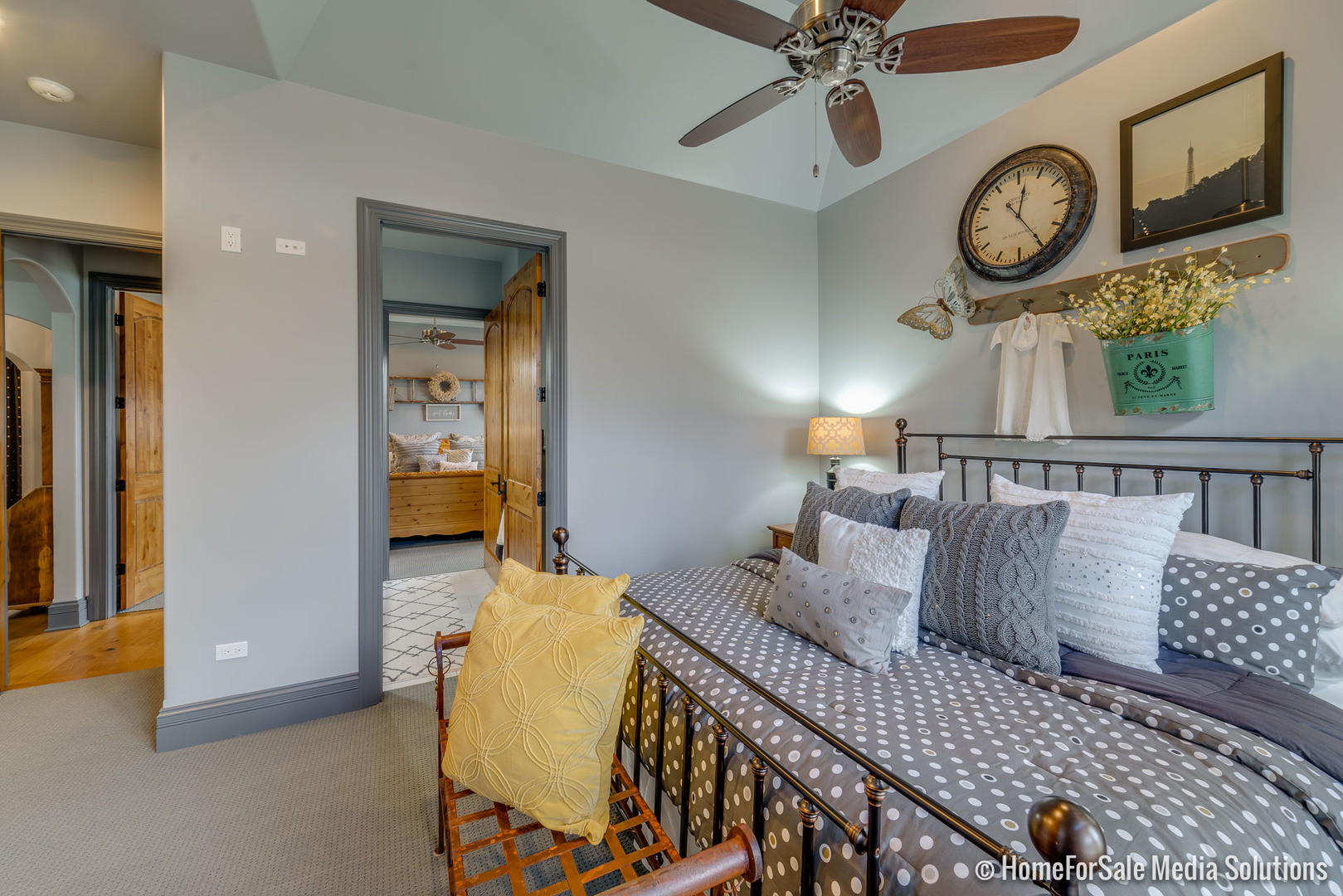 1051 Parkside Road Naperville, IL 60540 - Photo 27 of 52 a bedroom with a bed and a chandelier