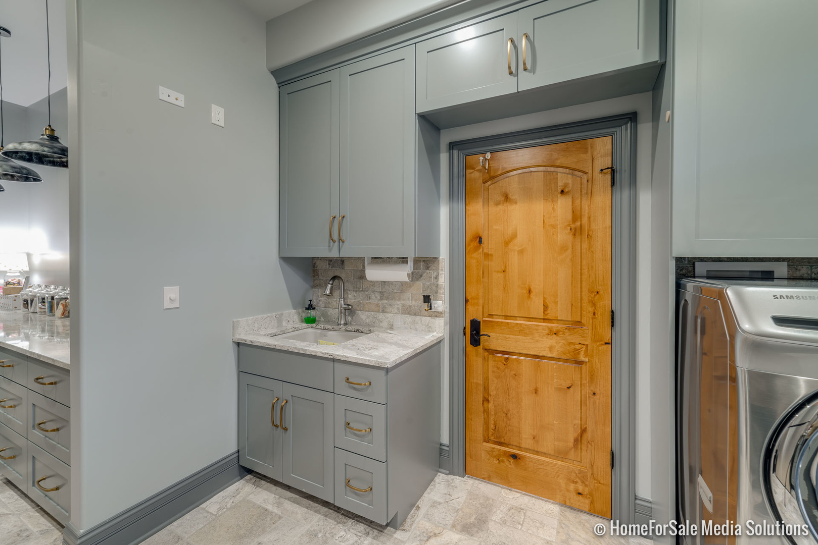 1051 Parkside Road Naperville, IL 60540 - Photo 28 of 52 a utility room with cabinets washer and dryer