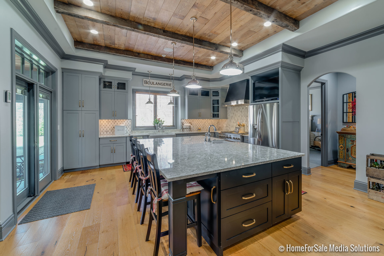 1051 Parkside Road Naperville, IL 60540 - Photo 4 of 52 a kitchen with stainless steel appliances granite countertop a sink a counter space and wooden floor