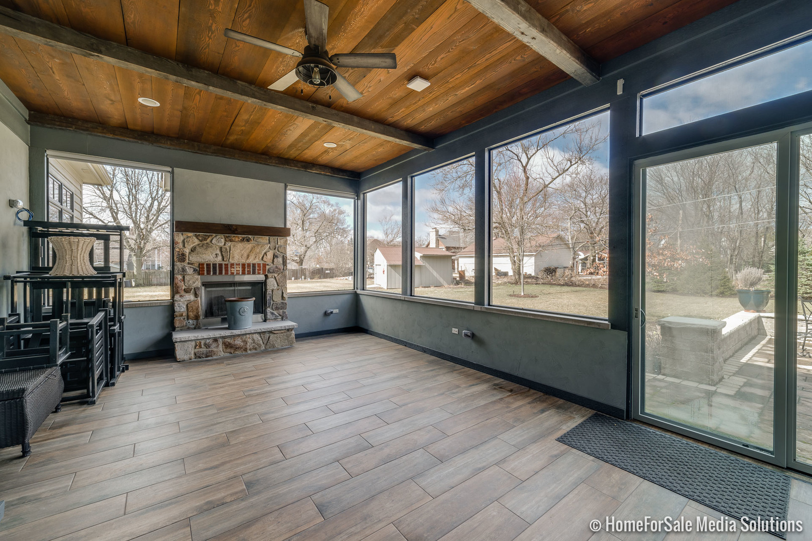 1051 Parkside Road Naperville, IL 60540 - Photo 10 of 52 a room with wooden floors and furniture