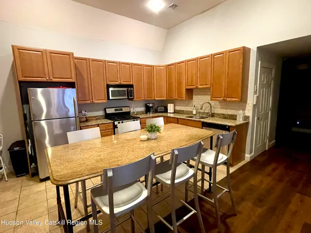 a bed room with a bed and a couch