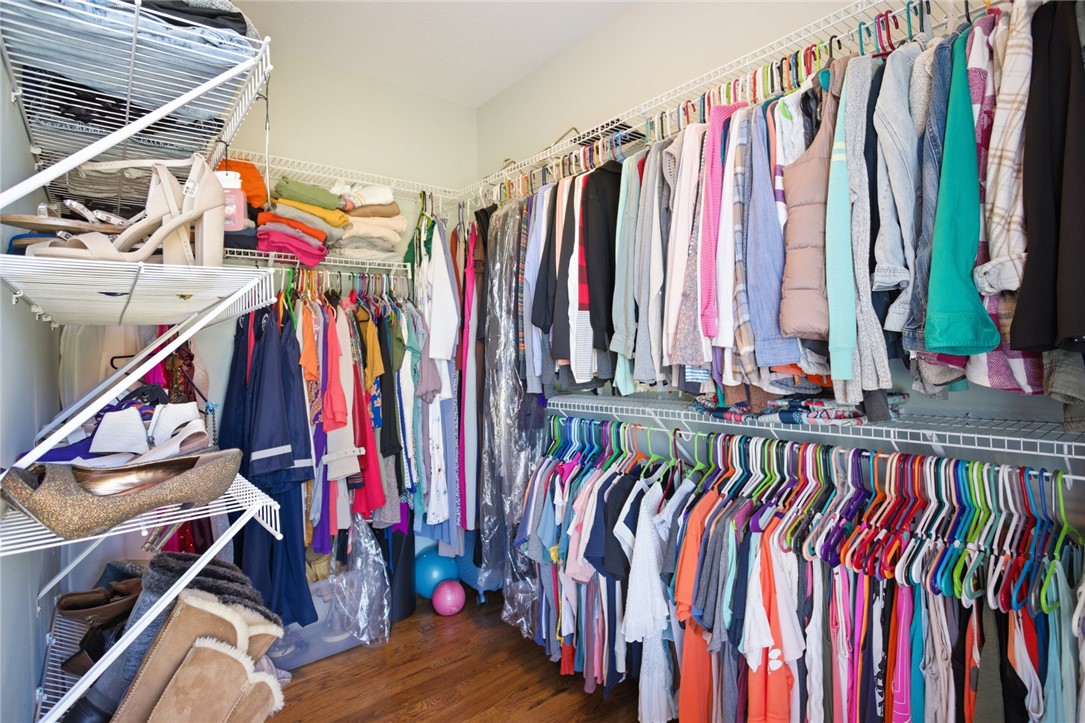 426 Oak Creek Road Seneca, SC 29678 - Photo 20 of 50 This spacious closet features ample shelving and hanging space for effortless organization.