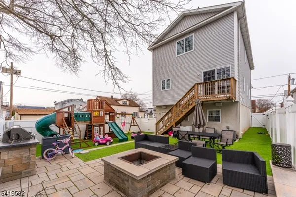 a view of the house with outdoor seating space