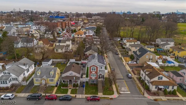 an aerial view of a city with lots of residential buildings