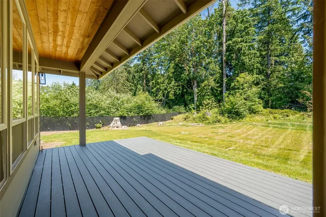 a view of swimming pool with an outdoor space and seating area