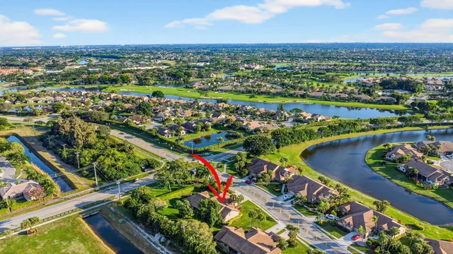 a view of a patio with table and chairs with wooden floor and fence
