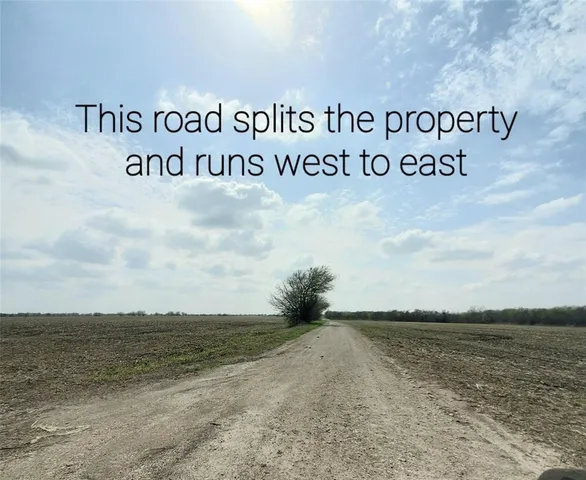 a view of a street with an ocean view