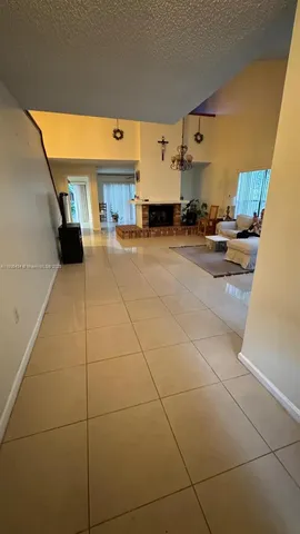 a kitchen with stainless steel appliances a sink and a counter top space