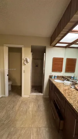 a view of a kitchen with a sink