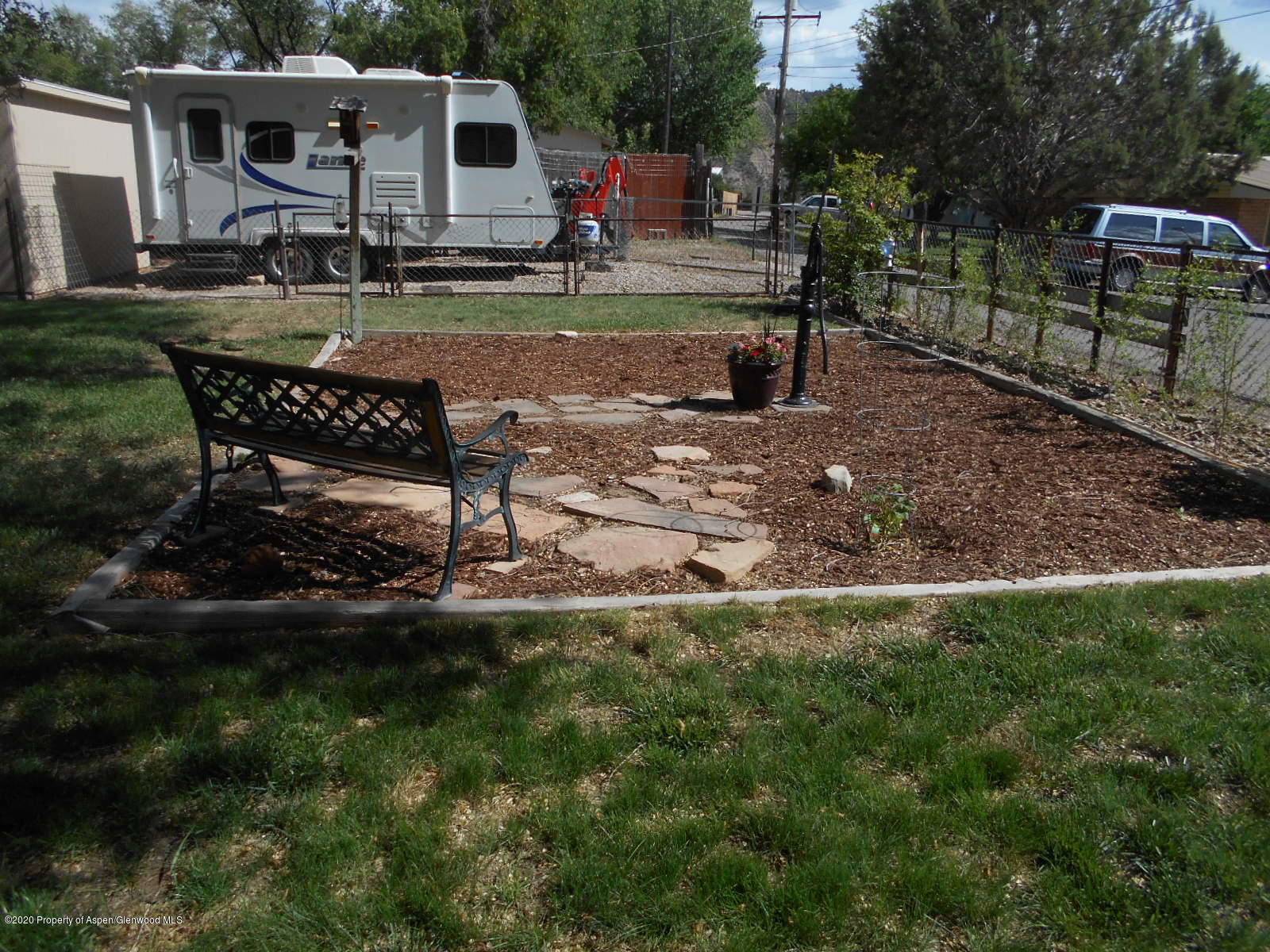 217 Ash Avenue Rifle, CO 81650 - Photo 23 of 25 a view of backyard with sitting area